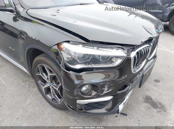 WBXHT3C38G5E55439 2016 BMW X1 Black 