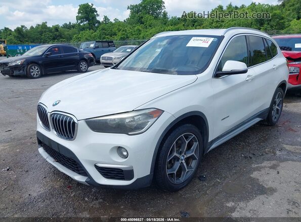 WBXHT3C38GP886476 2016 BMW X1 White 