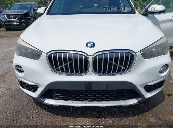 WBXHT3C38GP886476 2016 BMW X1 White 