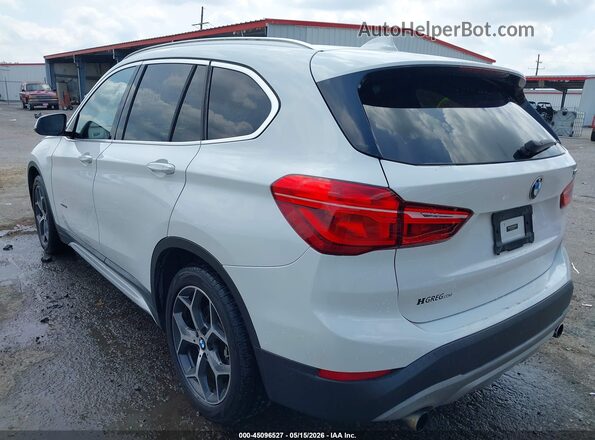 WBXHT3C38GP886476 2016 BMW X1 White 