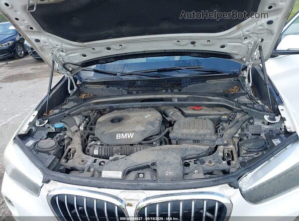 WBXHT3C38GP886476 2016 BMW X1 White 