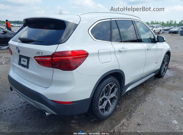 WBXHT3C38GP886476 2016 BMW X1 White 