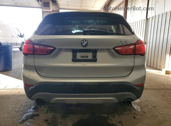 WBXHT3C38H5F79633 2017 BMW X1 Серебряный Вид сзади
