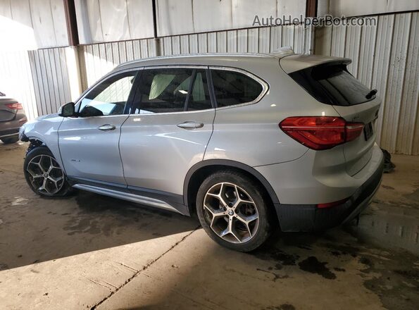 WBXHT3C38H5F79633 2017 BMW X1 Серебряный Задняя левая четверть