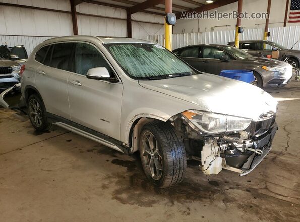 WBXHT3C38H5F79633 2017 BMW X1 Серебряный Передняя правая четверть