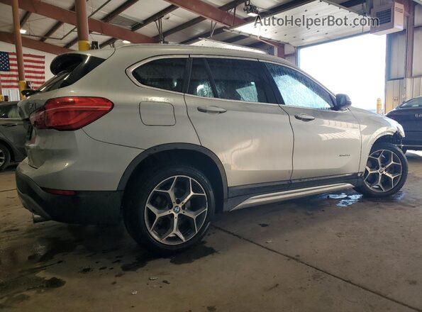 WBXHT3C38H5F79633 2017 BMW X1 Серебряный Задняя правая четверть