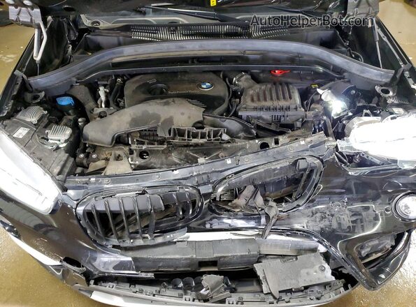 WBXHT3C38J3H33694 2018 BMW X1 Black Սալոնի հետևի տեսք