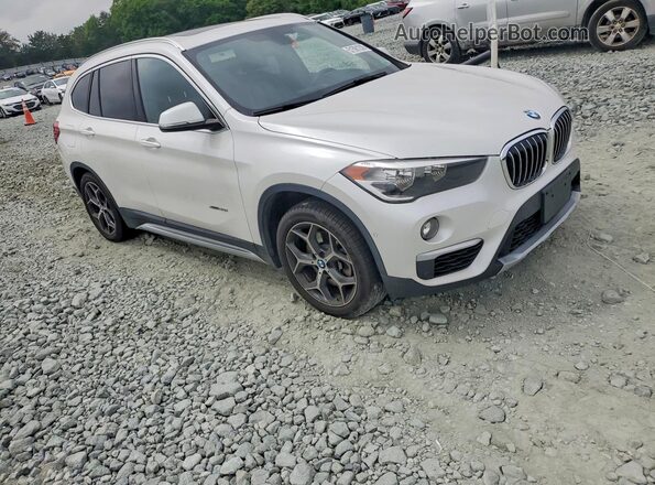 WBXHT3C39G5E56356 2016 BMW X1 Белый Передняя правая четверть