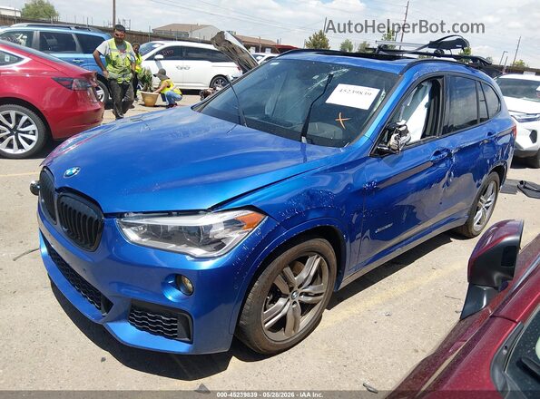 WBXHT3C39H5F83660 2017 BMW X1 Blue Առջևի ձախ երեք քառորդ տեսարան
