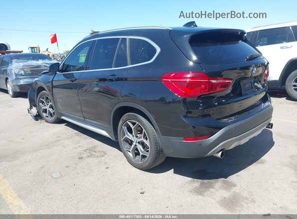 WBXHT3C3XGP884857 2016 BMW X1 Black Rear left