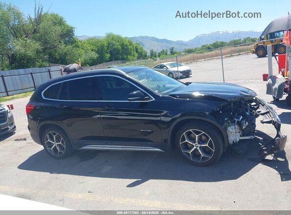 WBXHT3C3XGP884857 2016 BMW X1 Black Rear interior view