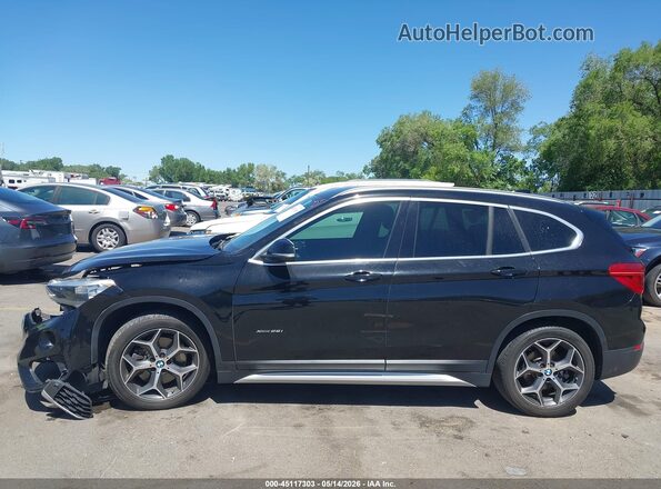 WBXHT3C3XGP884857 2016 BMW X1 Black 360 interior view