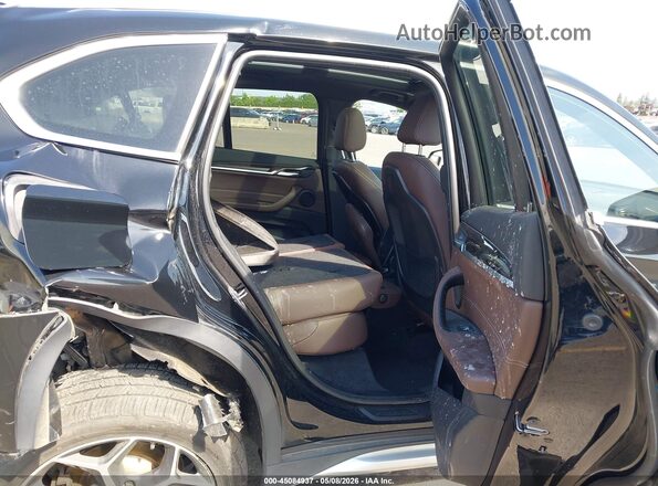WBXHT3C3XH5F69069 2017 BMW X1 Black VIN კოდის სტიკერის ხედი