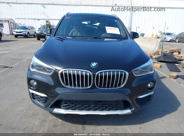 WBXHT3C3XH5F69069 2017 BMW X1 Black უკანა სალონის ხედი