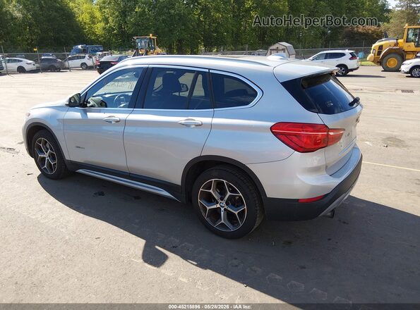 WBXHT3C3XH5F82078 2017 BMW X1 Silver Հետևի ձախ
