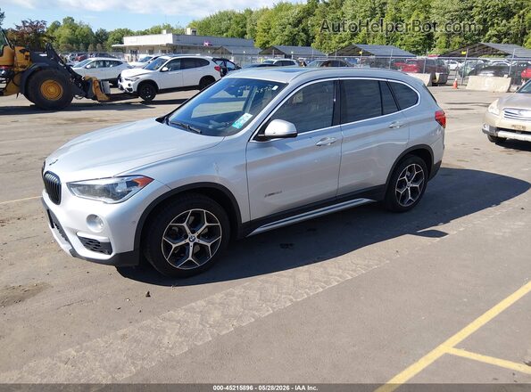WBXHT3C3XH5F82078 2017 BMW X1 Silver Առջևի ձախ երեք քառորդ տեսարան