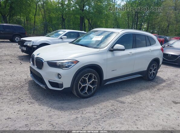 WBXHT3C3XJ5K29875 2018 BMW X1 White წინა მარცხენა ხედი სამი მეოთხედიდან