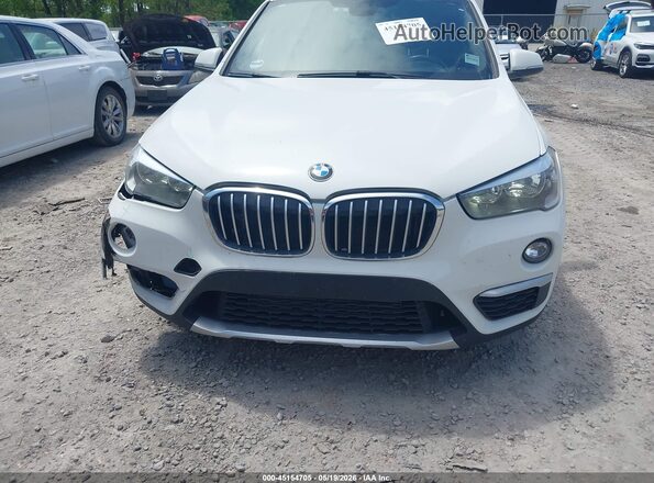 WBXHT3C3XJ5K29875 2018 BMW X1 White ხელსაწყოთა პანელის ხედი