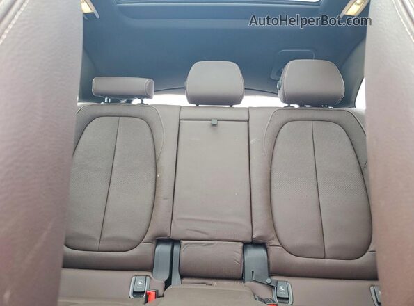WBXHT3C55K5L37257 2019 BMW X1 White Rear seats view