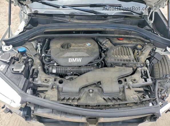 WBXHT3C55K5L37257 2019 BMW X1 White Engine compartment view