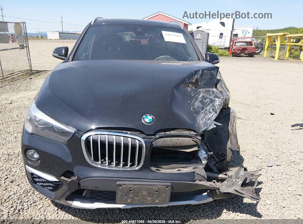WBXHT3C55K5L89410 2019 BMW X1 Black Widok wnętrza z tyłu