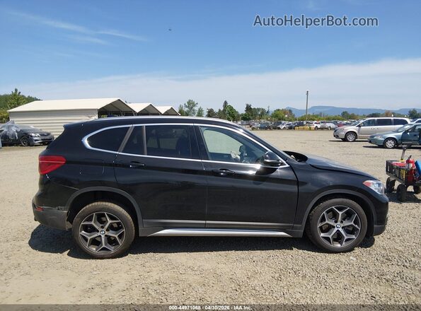 WBXHT3C55K5L89410 2019 BMW X1 Black Widok wnętrza 360 stopni