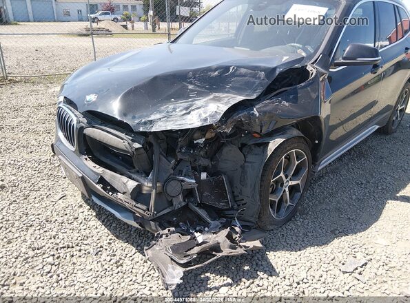 WBXHT3C55K5L89410 2019 BMW X1 Black Widok z przodu
