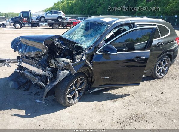 WBXHT3Z34H4A53545 2017 BMW X1 Black Przód lewy