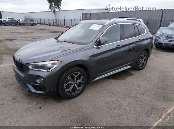 WBXHT3Z38H4A53984 2017 BMW X1 Gray წინა მარცხენა ხედი სამი მეოთხედიდან
