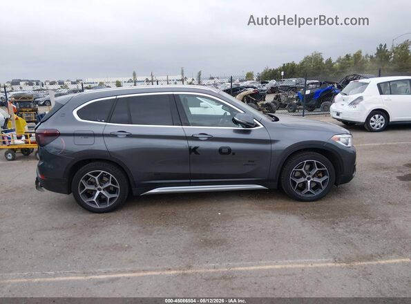WBXHT3Z38H4A53984 2017 BMW X1 Gray უკანა სალონის ხედი