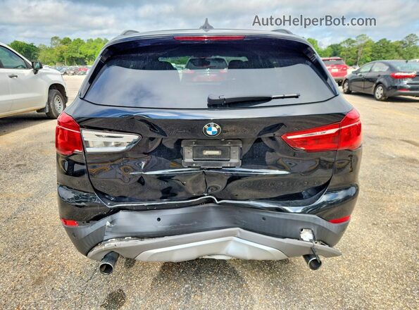 WBXHU7C33H5H38014 2017 BMW X1 Black Widok z tyłu