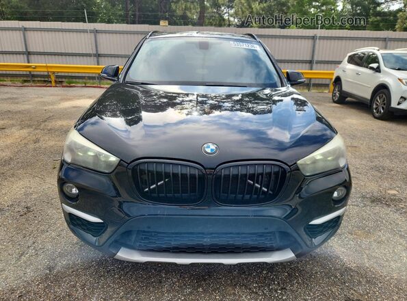 WBXHU7C33H5H38014 2017 BMW X1 Black Widok z przodu