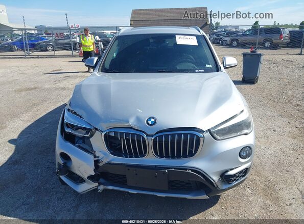 WBXHU7C33J3F04540 2018 BMW X1 Silver Вид щитка приладів