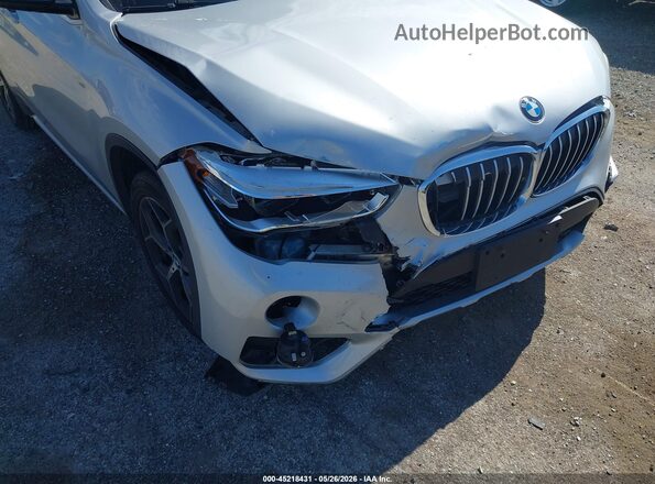 WBXHU7C33J3F04540 2018 BMW X1 Silver Вид спереду