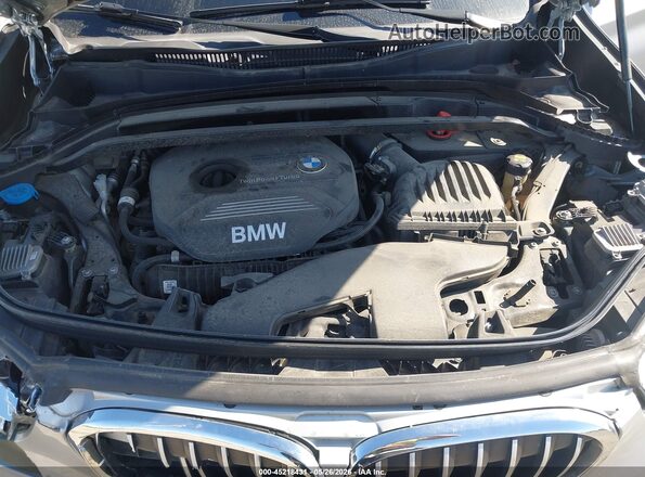 WBXHU7C33J3F04540 2018 BMW X1 Silver Вид ззаду