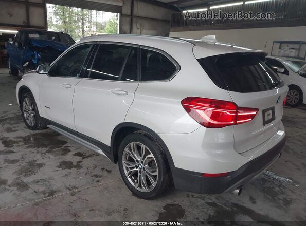 WBXHU7C36H5H32837 2017 BMW X1 White Rear left