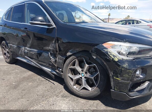 WBXHU7C5XK3H46275 2019 BMW X1 Black 
