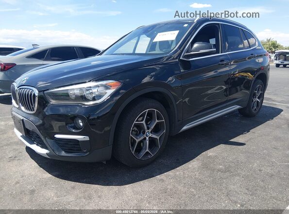 WBXHU7C5XK3H46275 2019 BMW X1 Black 