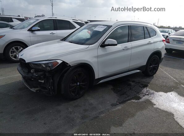 WBXJG7C00L5P69869 2020 BMW X1 White Առջևի ձախ երեք քառորդ տեսարան