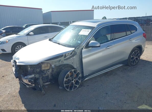 WBXJG7C03M5S82571 2021 BMW X1 Серебряный Передняя левая четверть