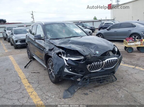 WBXJG7C08M5T11269 2021 BMW X1 Black Vista frontal