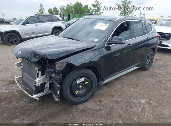WBXJG9C05M5U09977 2021 BMW X1 Black Առջևի ձախ երեք քառորդ տեսարան