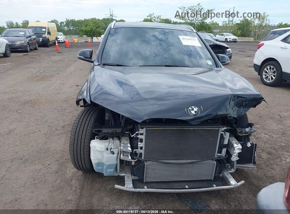 WBXJG9C05M5U09977 2021 BMW X1 Black Սալոնի հետևի տեսք