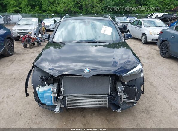 WBXJG9C07N5V48820 2022 BMW X1 Black Vista interior trasera