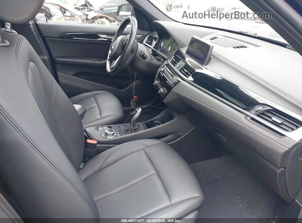 WBXJG9C08L5P60820 2020 BMW X1 Синий Вид салона спереди