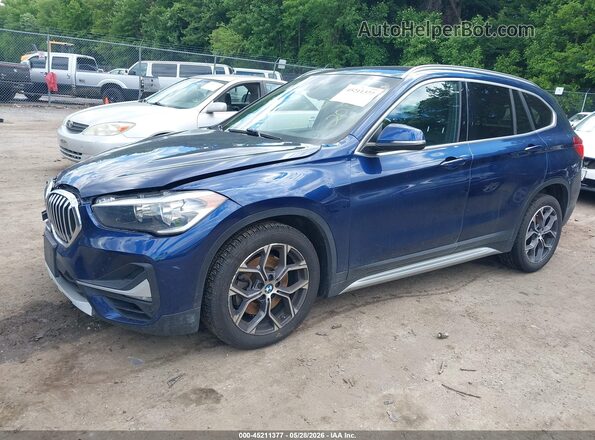 WBXJG9C08L5P60820 2020 BMW X1 Синий Передняя левая четверть