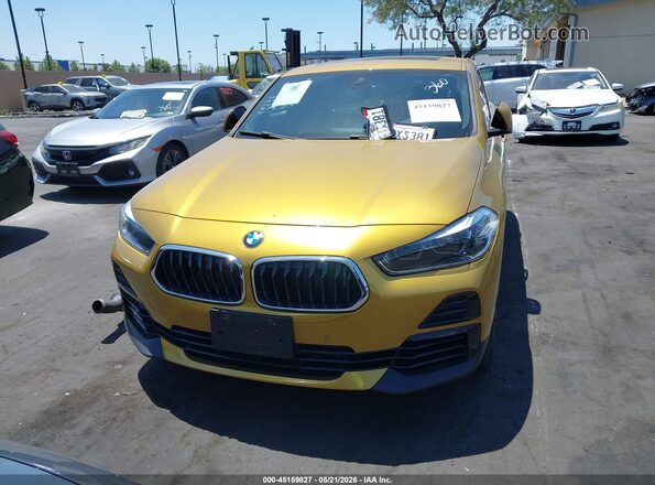 WBXYH9C08M5T03065 2021 BMW X2 Желтый Вид задней части салона