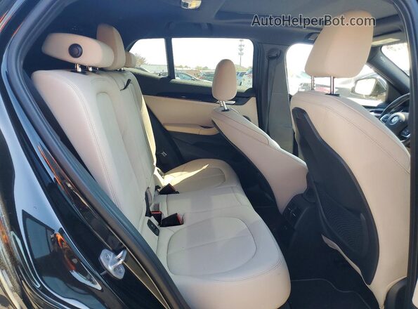 WBXYJ1C04M5S44800 2021 BMW X2 Black Widok wnętrza z tyłu