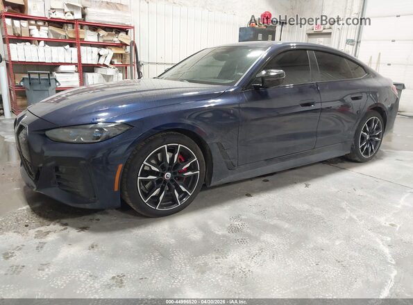 WBY33AW06PFP31605 2023 BMW I4 Blue Front left