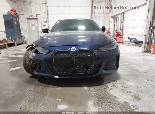 WBY33AW06PFP31605 2023 BMW I4 Blue Instrument cluster view
